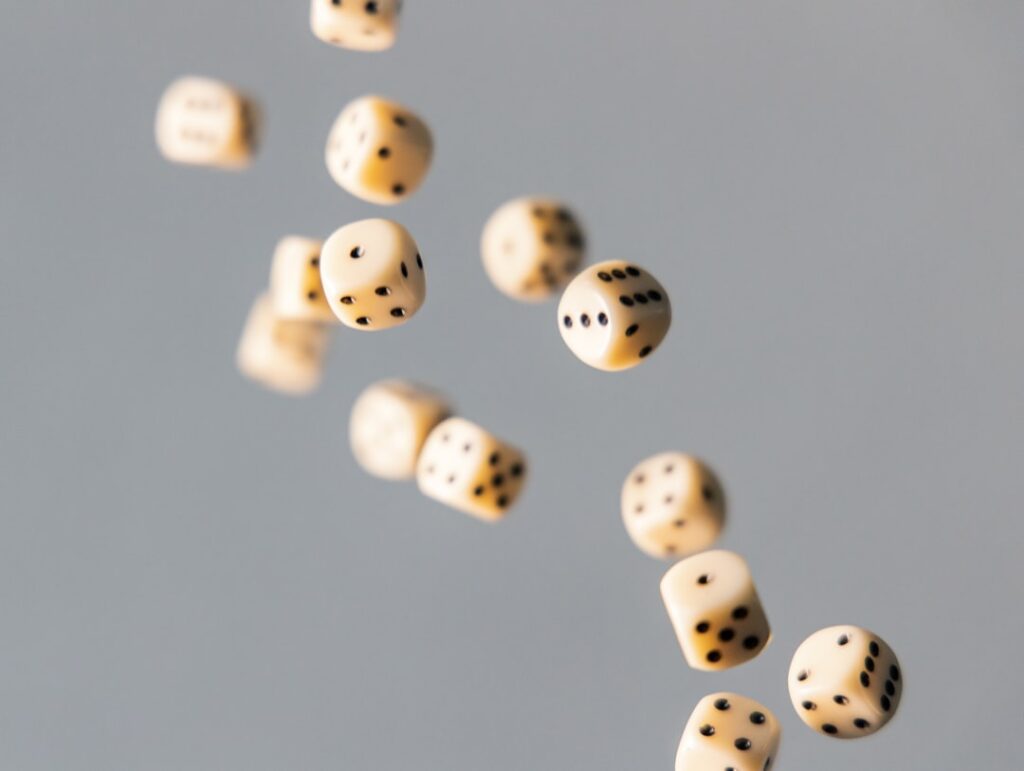 Dés en train de rouler sur une table, jeu du Yams